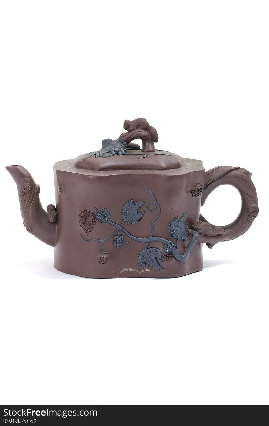 Isolated clay teapot on white background