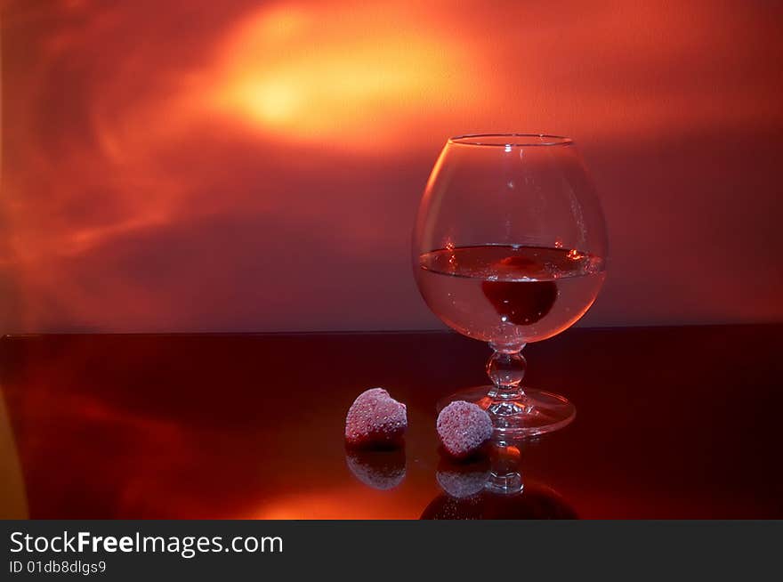 Glass of white wine  and frozen berries. Glass of white wine  and frozen berries