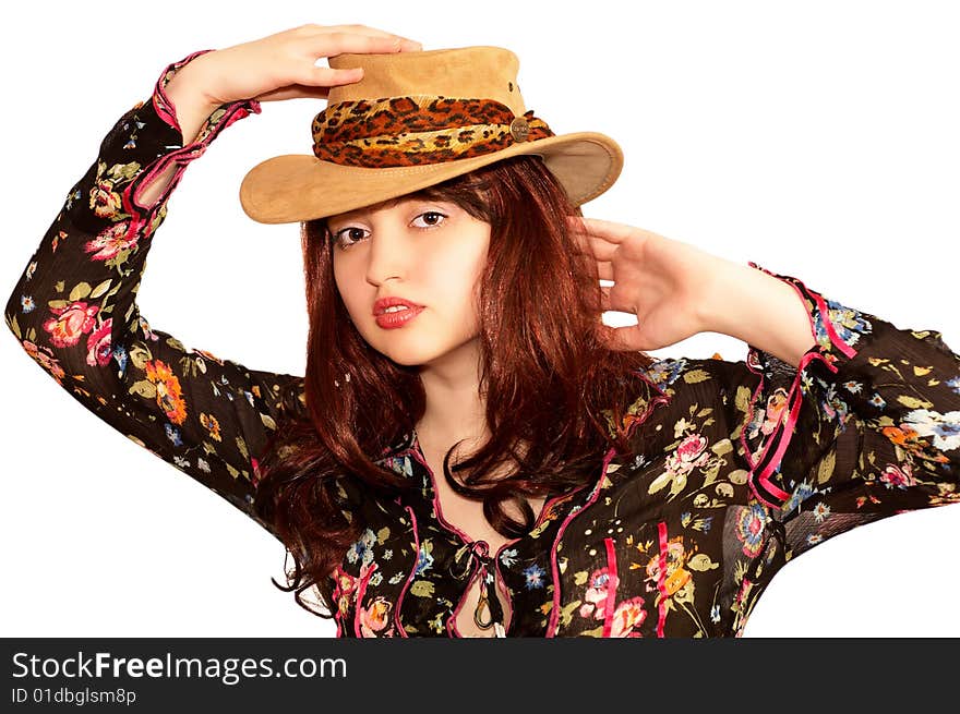 Young sensual woman in a hat, isolated