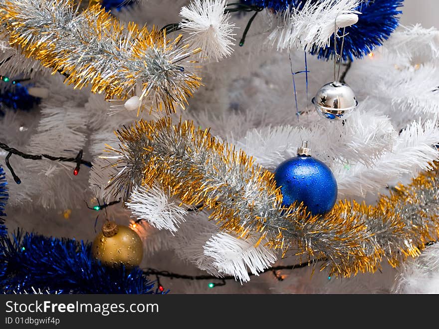 White Christmas tree with beautiful ornaments. White Christmas tree with beautiful ornaments