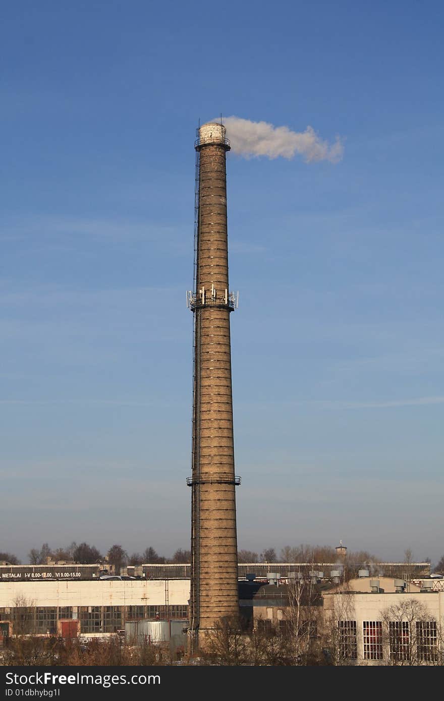 Air pollution. Factory. Blue background