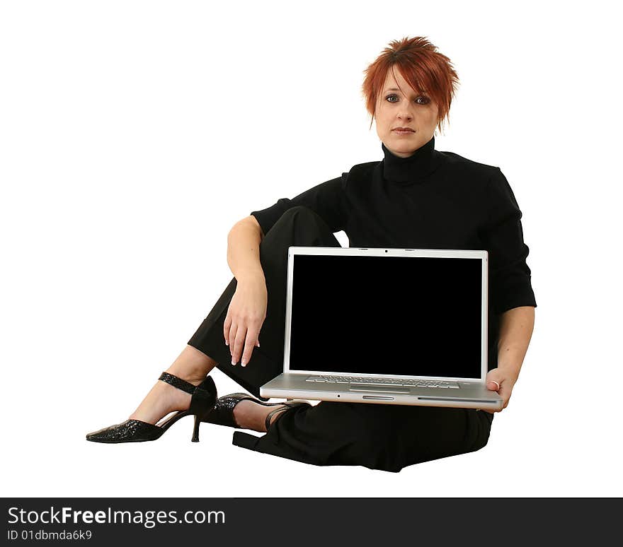 Beautiful 30 something woman sitting with laptop over white. Beautiful 30 something woman sitting with laptop over white.