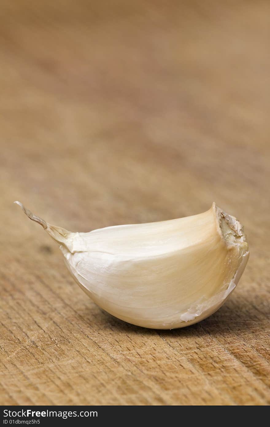 Garlic on a wooden cutting table