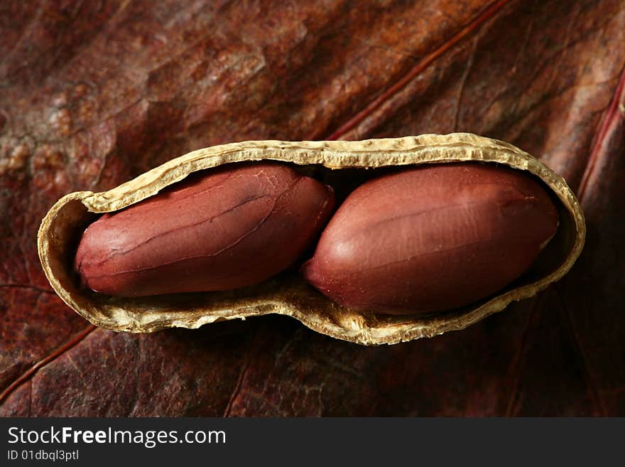 Peanuts macro over wood background