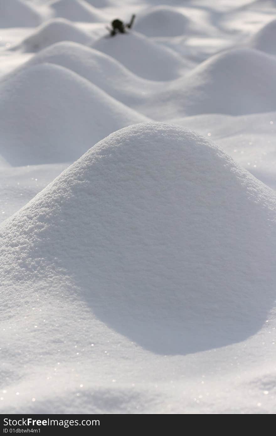 Stacks of snow in the field