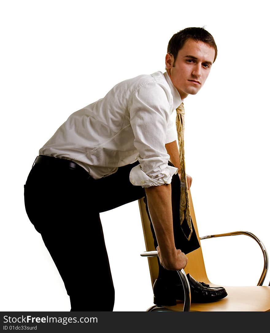 Young Man with Foot in Chair