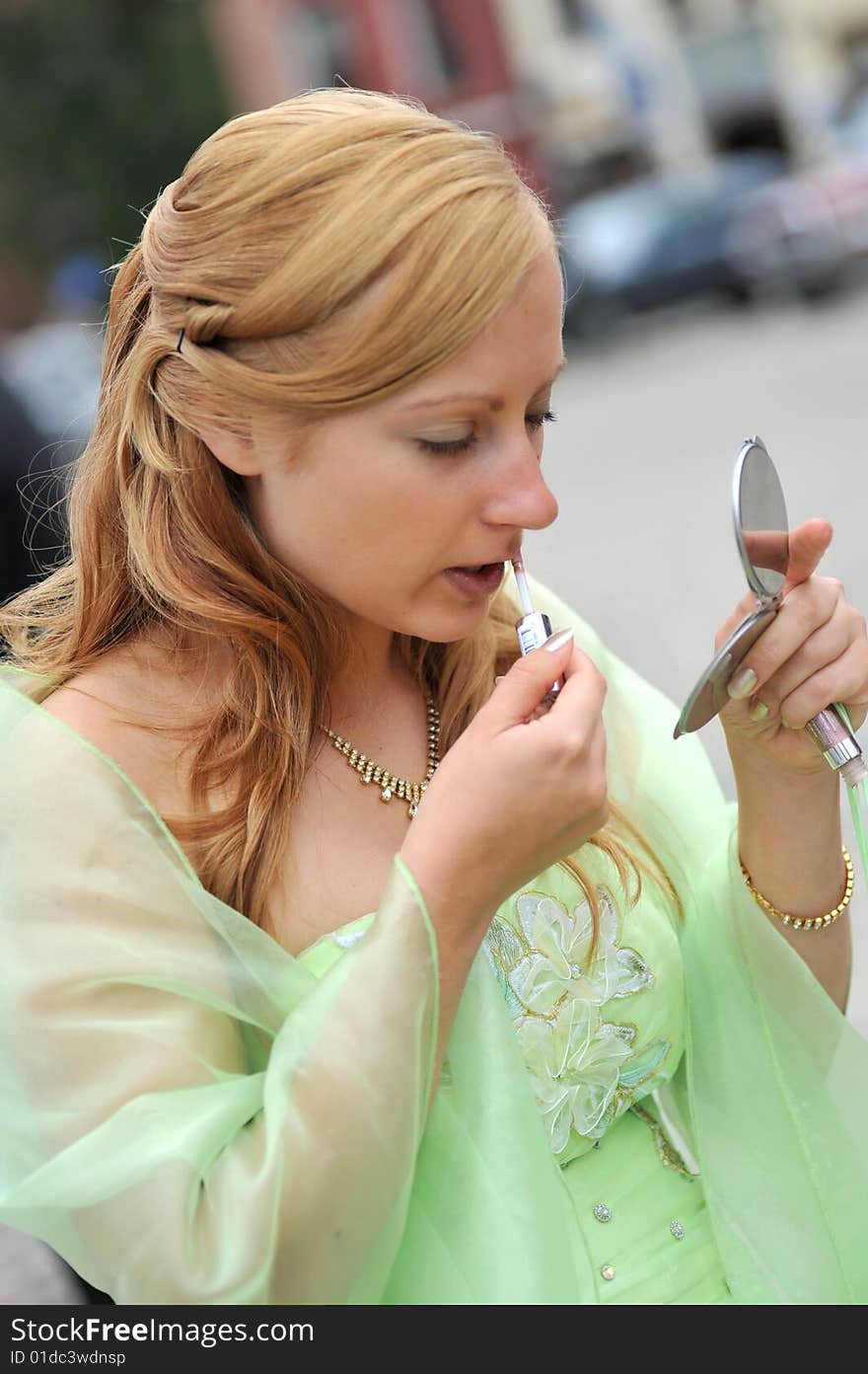 Woman Applying Make Up