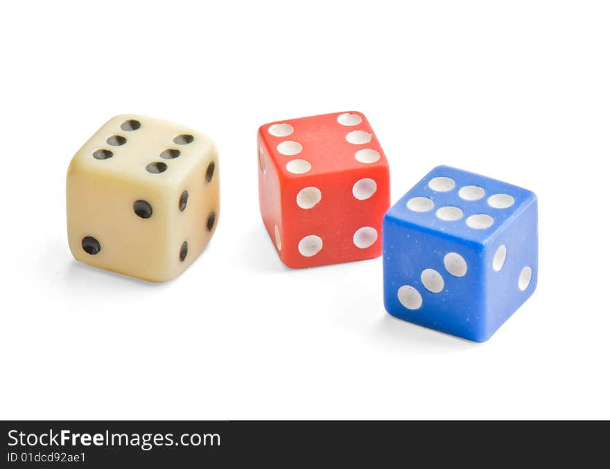 Multicolor dice close up isolated on white background (with clipping path)