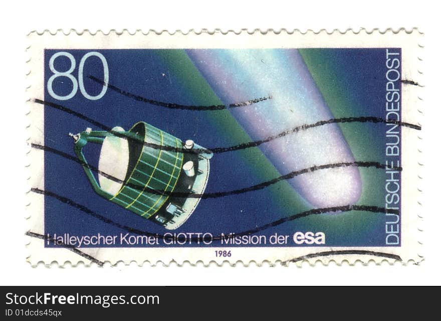 Old canceled german stamp with Giotto robotic spacecraft