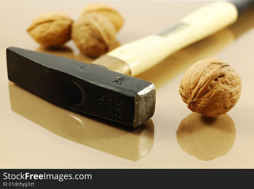 Walnuts and hammer