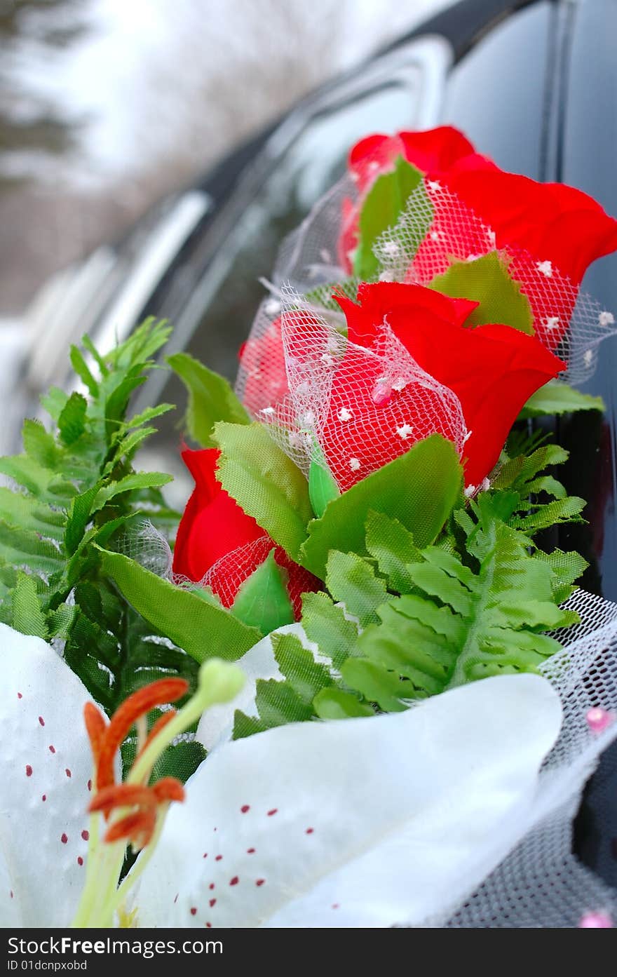 Wedding decoration (flowers) on black limousine car. Wedding decoration (flowers) on black limousine car.