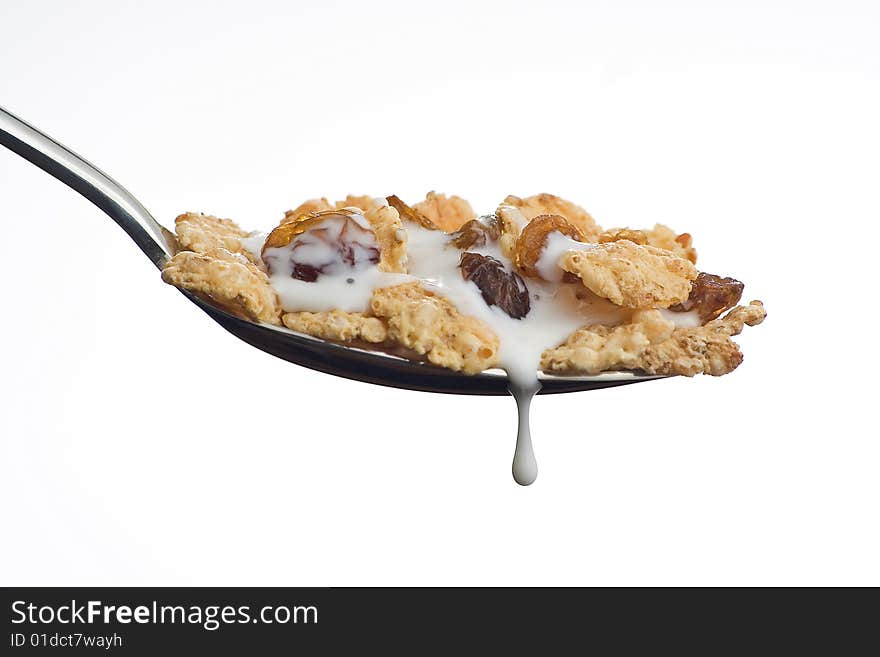 Bowl of cereal with raisins and milk