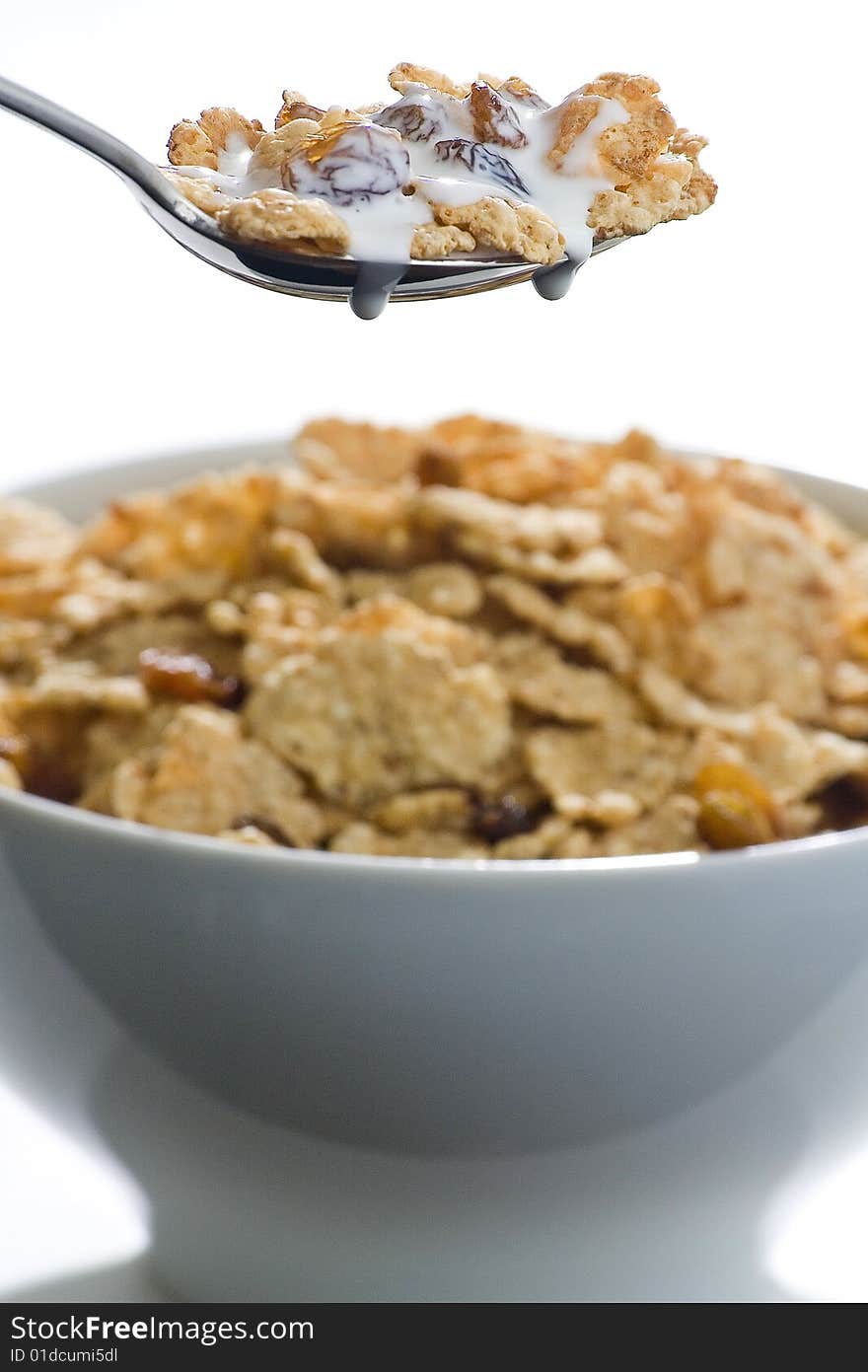 Bowl Of Cereal With Raisins And Milk