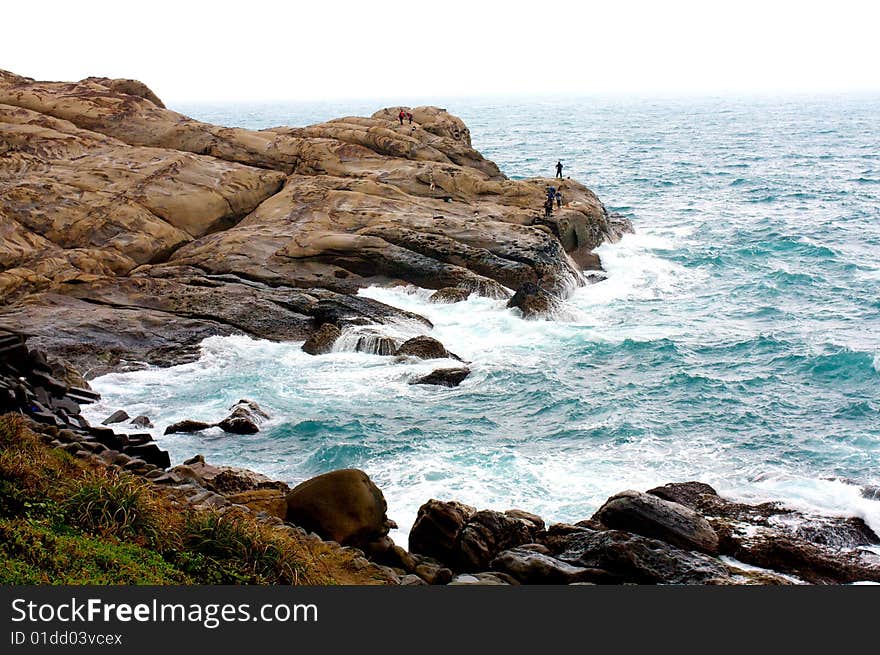 Rocky coast and fishing people