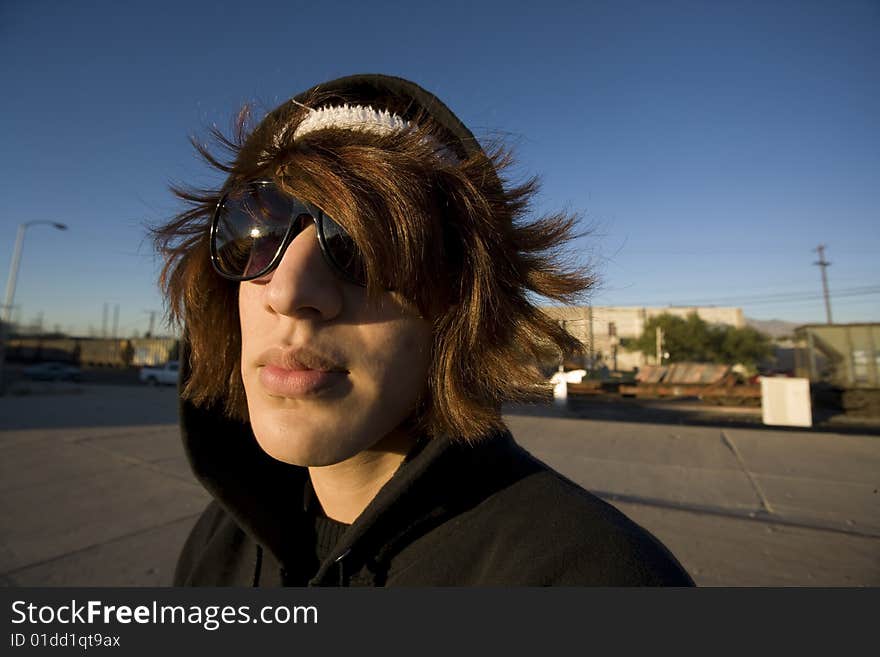 Handsome young Hispanic man in an urban setting