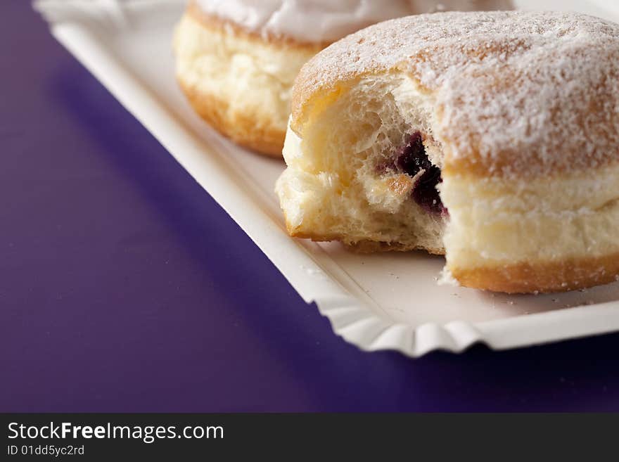 Donut, choux pastry filled with jam