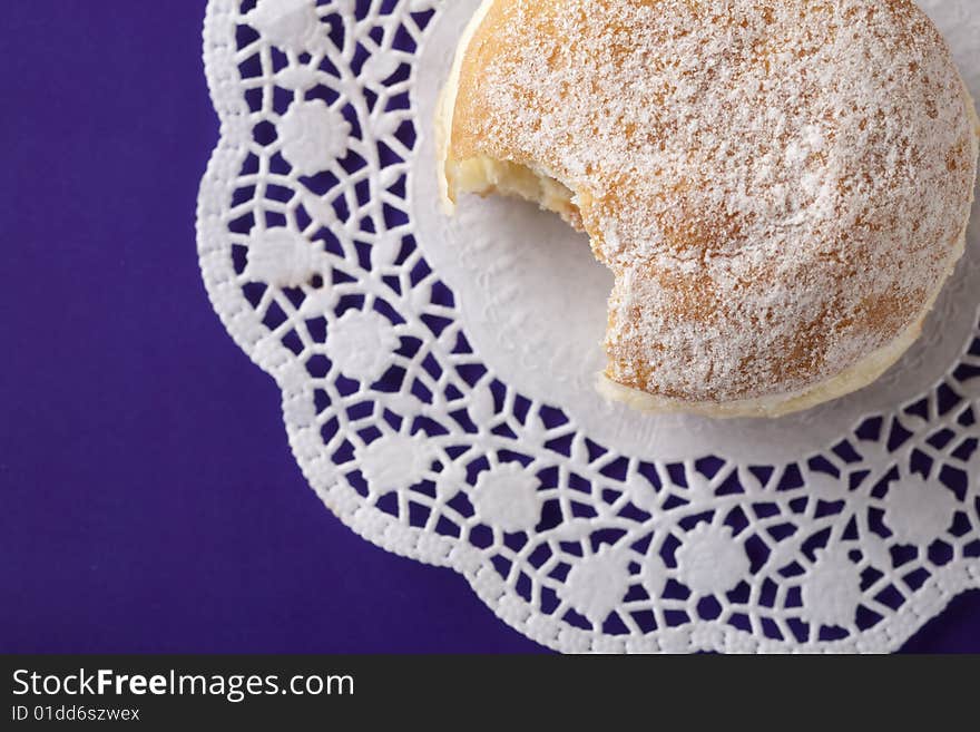 Donut, choux pastry filled with jam