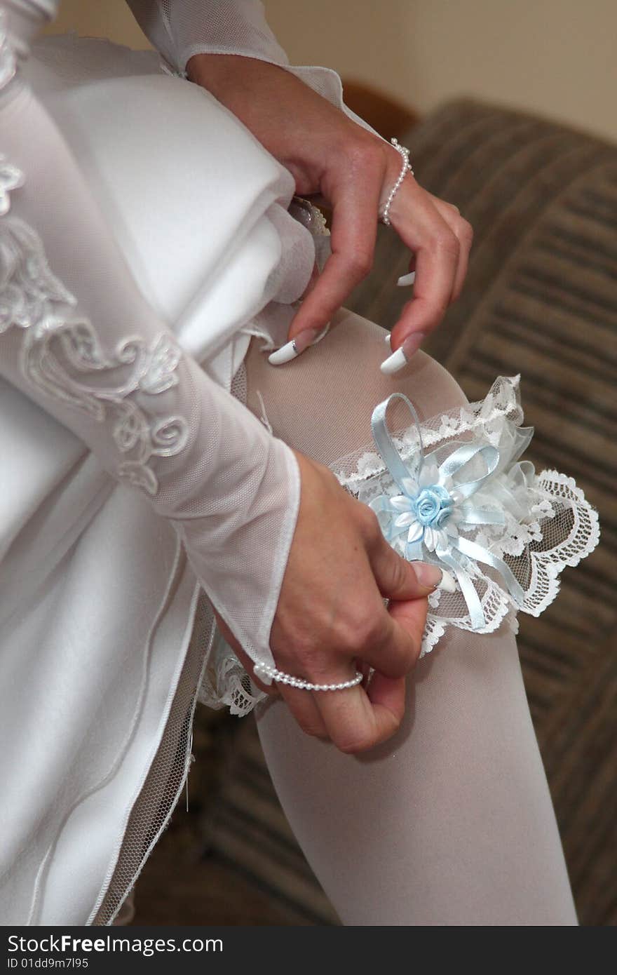 Garter on leg of the bride