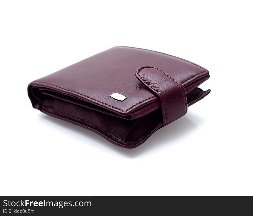 Purse with a fastener. It is isolated on a white background. Studio light.