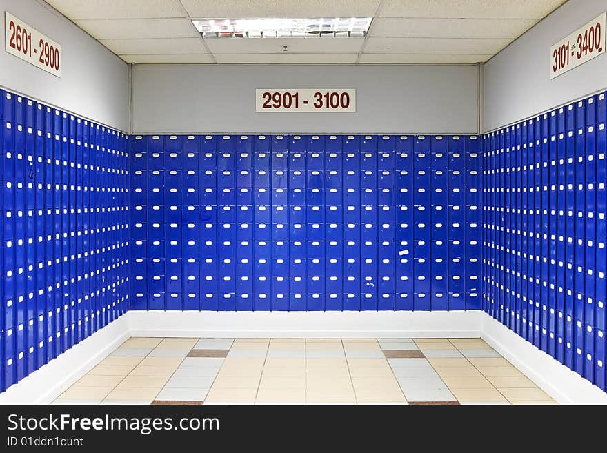 Room of blue Post Office boxes - landscape interior