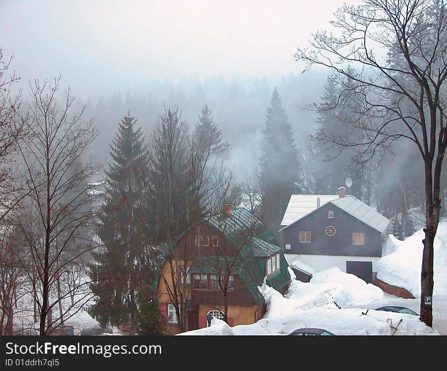 Spindleruv Mlyn: fog-covered mountain village in Czech Republic.