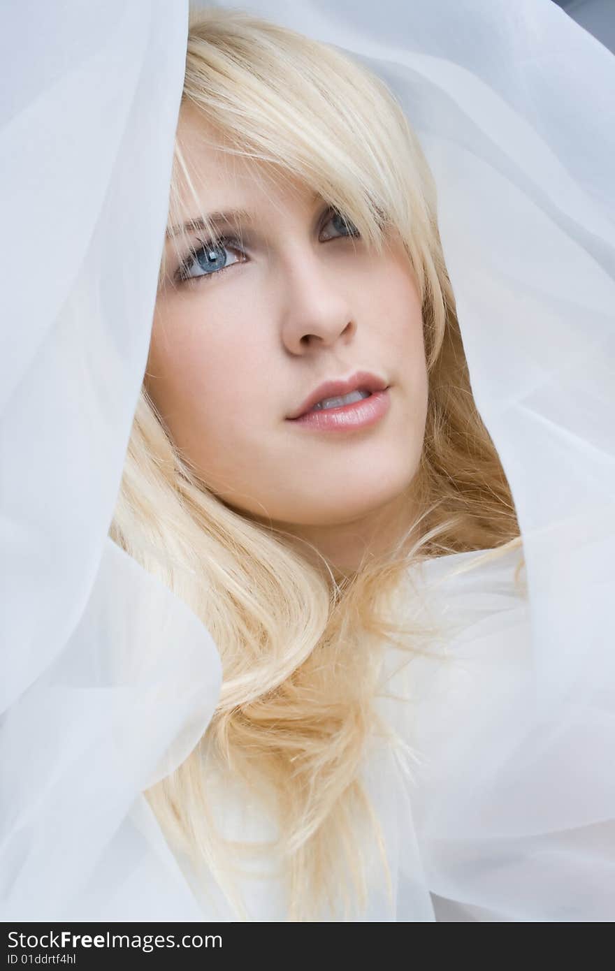 A beutiful blond girl in white looking for love. A beutiful blond girl in white looking for love