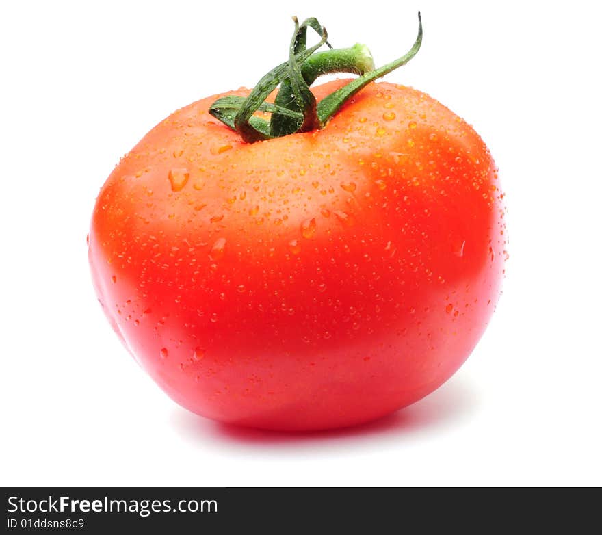 Shot of a freshly washed homegrown tomato. Shot of a freshly washed homegrown tomato