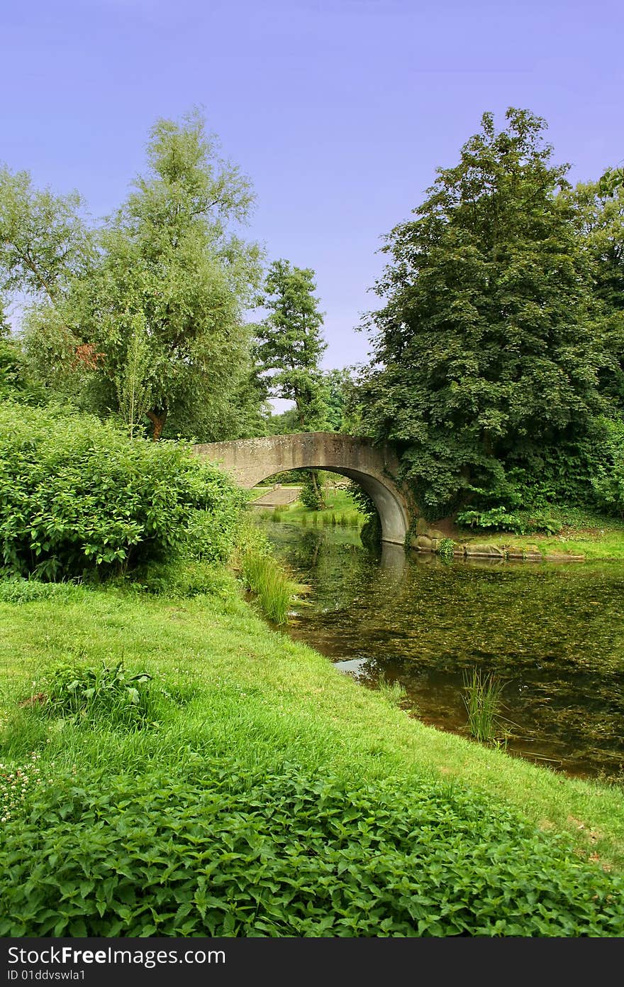 Bridge in an park on a sunny summer day. Bridge in an park on a sunny summer day