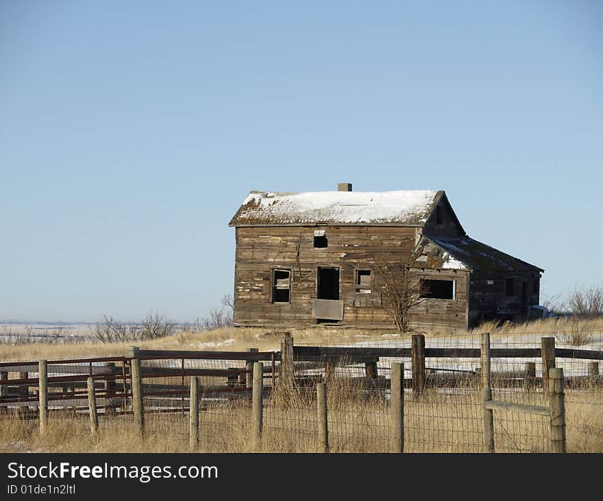 This turn of the century farm home long abandoned sits alone with only pigeons to call it home. This turn of the century farm home long abandoned sits alone with only pigeons to call it home.