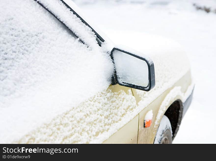 The Car Filled Up By Snow. Mirror With Snow