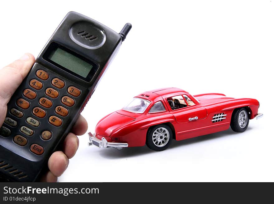 An old simulation mobile phone and old style car model on white background.

This mobile phone has been used for eight years.It retired in 2001. An old simulation mobile phone and old style car model on white background.

This mobile phone has been used for eight years.It retired in 2001.