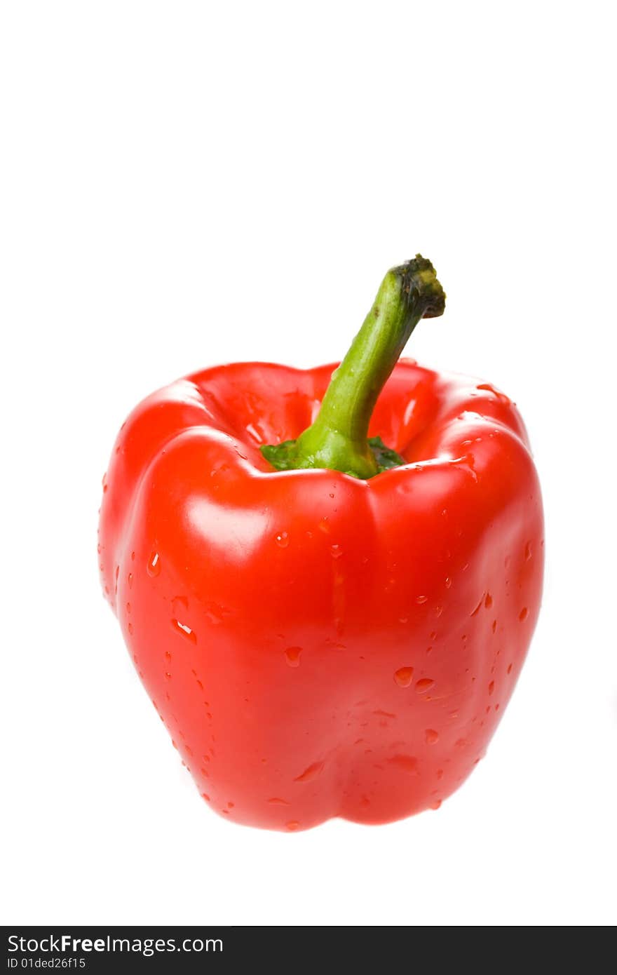 Single red bell pepper on white background