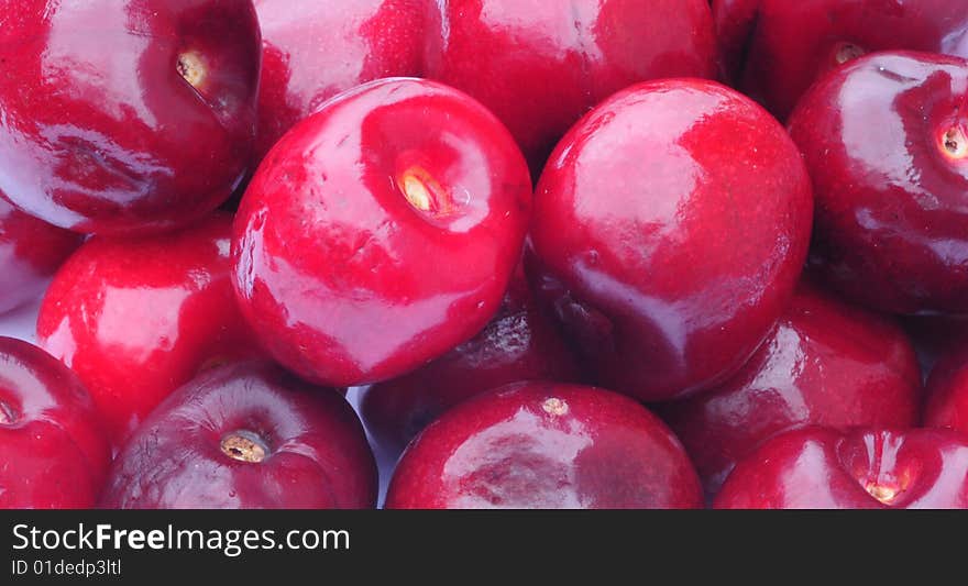 A close up shot of cherries filling the frame