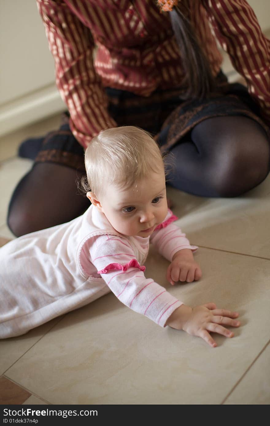 Little baby on the floor