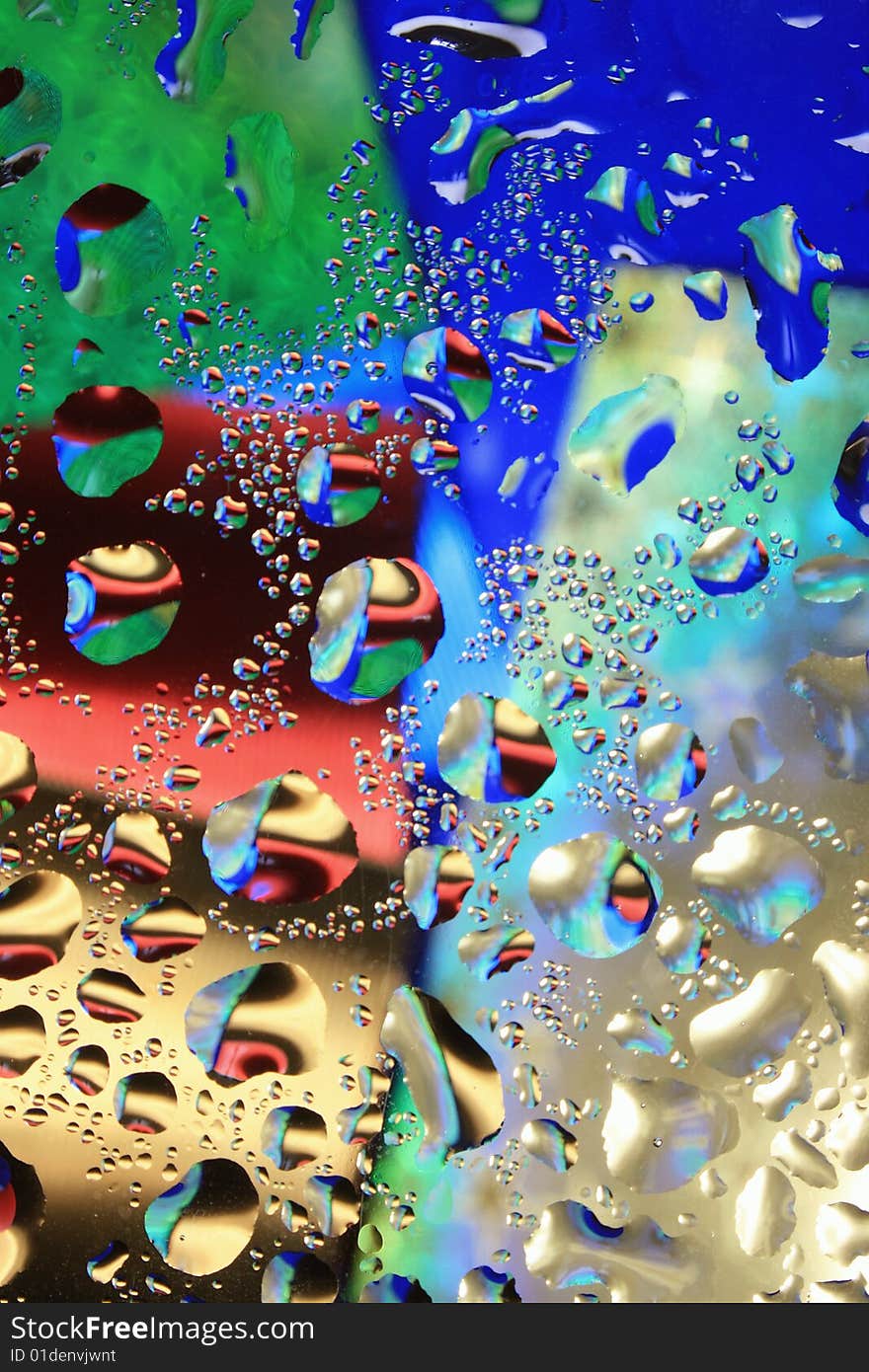 Multi-coloured drops of water. Multi-coloured drops of water