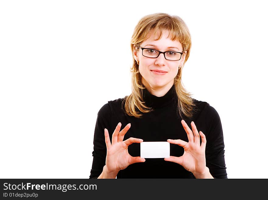 Smiling girl in glasses holds a white card. Smiling girl in glasses holds a white card