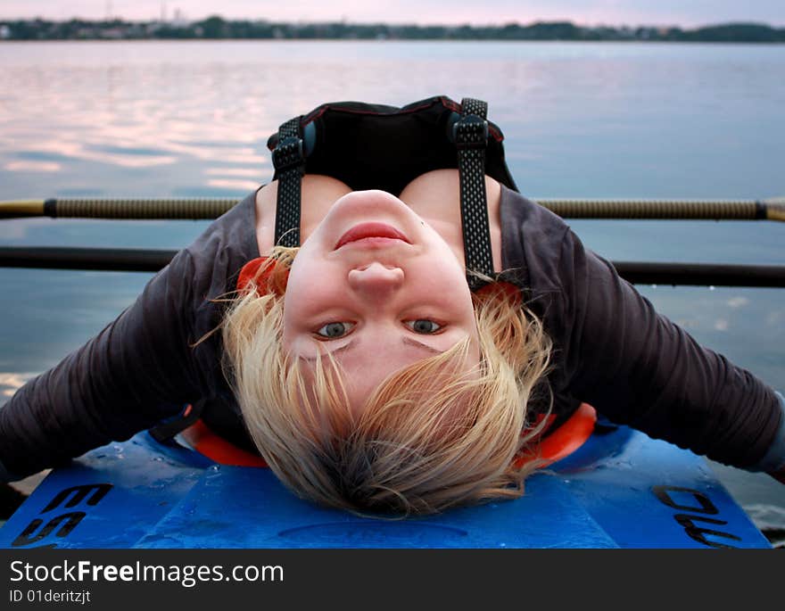 Girl lying on canoe