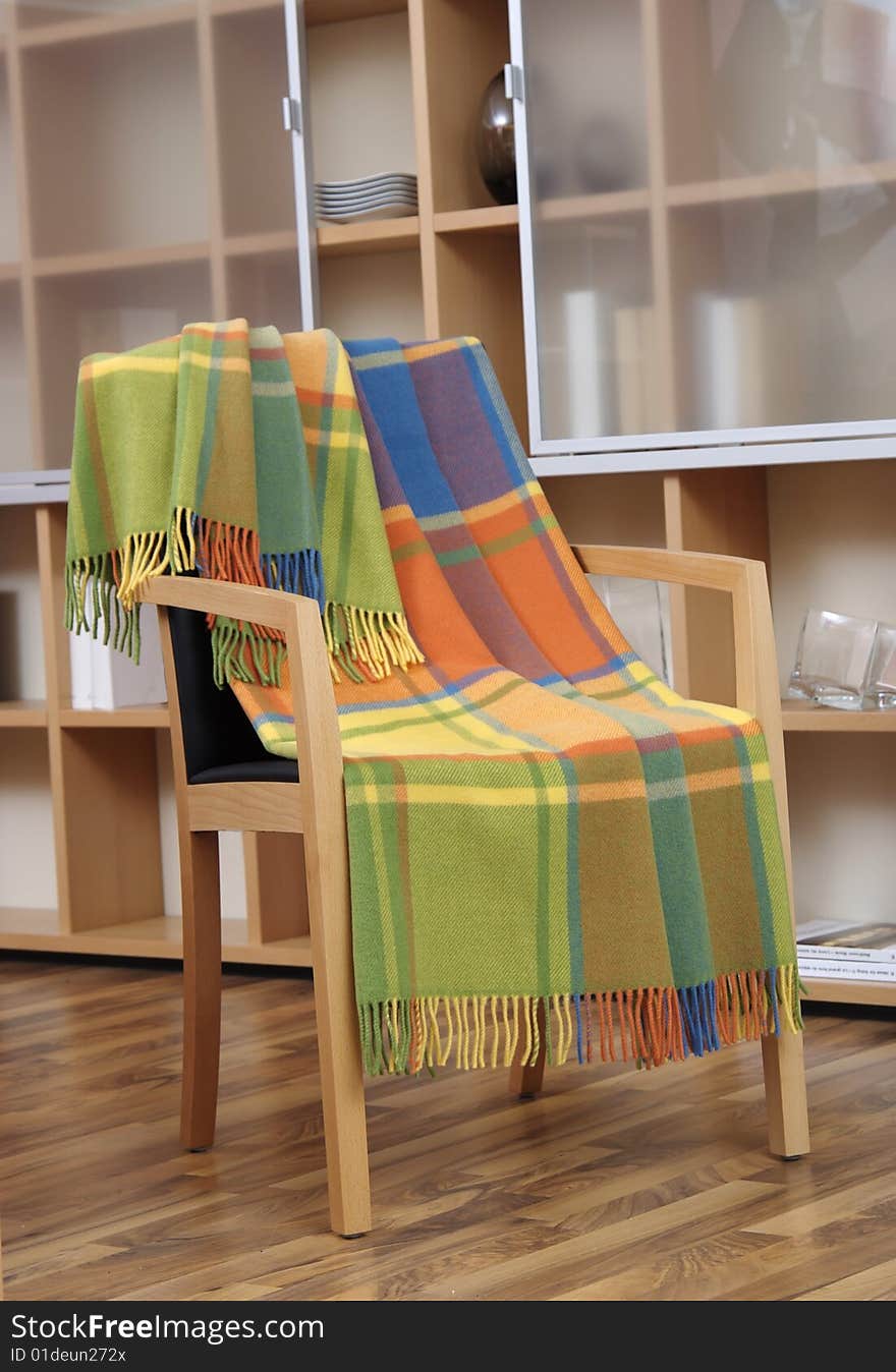 Plaid draped over a chair