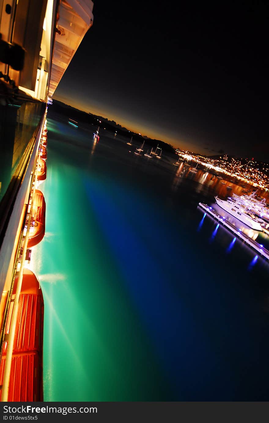 Colorful night scene of a port and rescue vessels. Colorful night scene of a port and rescue vessels