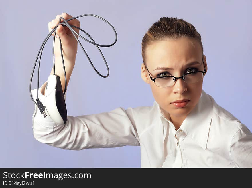 Businesswoman with computer mouse in a hand. Businesswoman with computer mouse in a hand