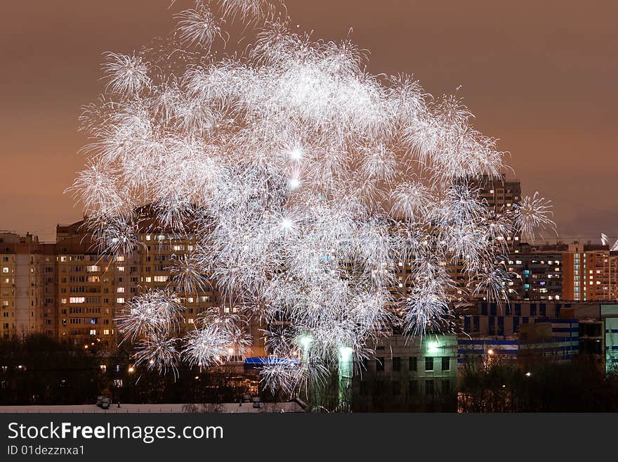 Fireworks over night city buildings. Fireworks over night city buildings