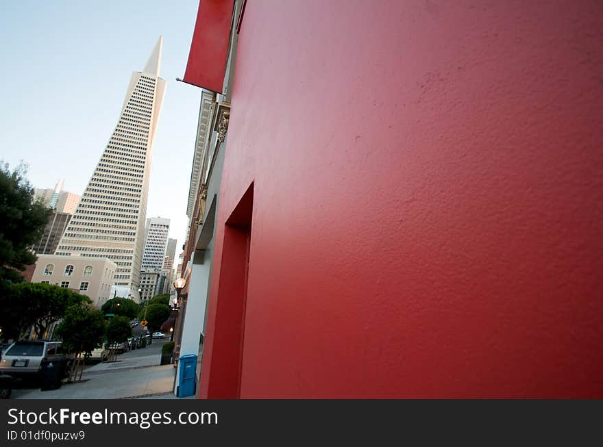 Transamerica Tower next to a red facade. Transamerica Tower next to a red facade.