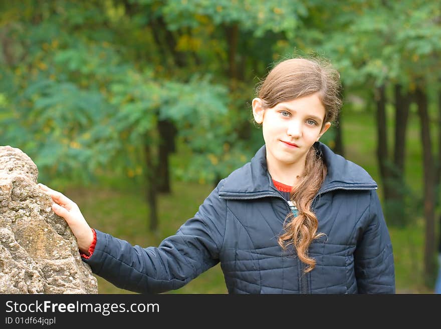 Portrait Teen Girl And Big Stone