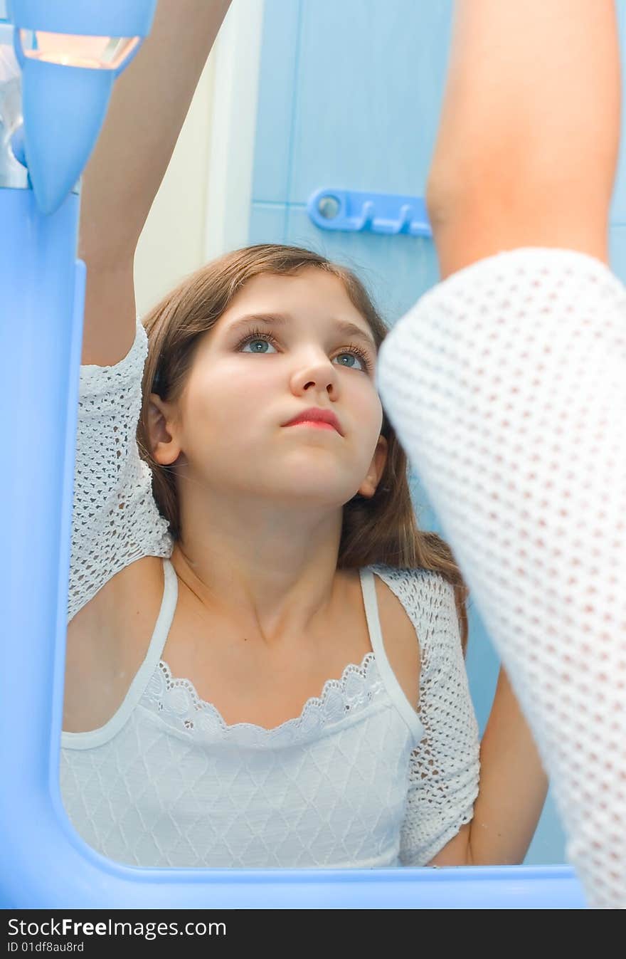 Teen girl in bathroom for your design