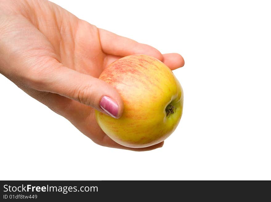 Woman hand holding an apple. Woman hand holding an apple.