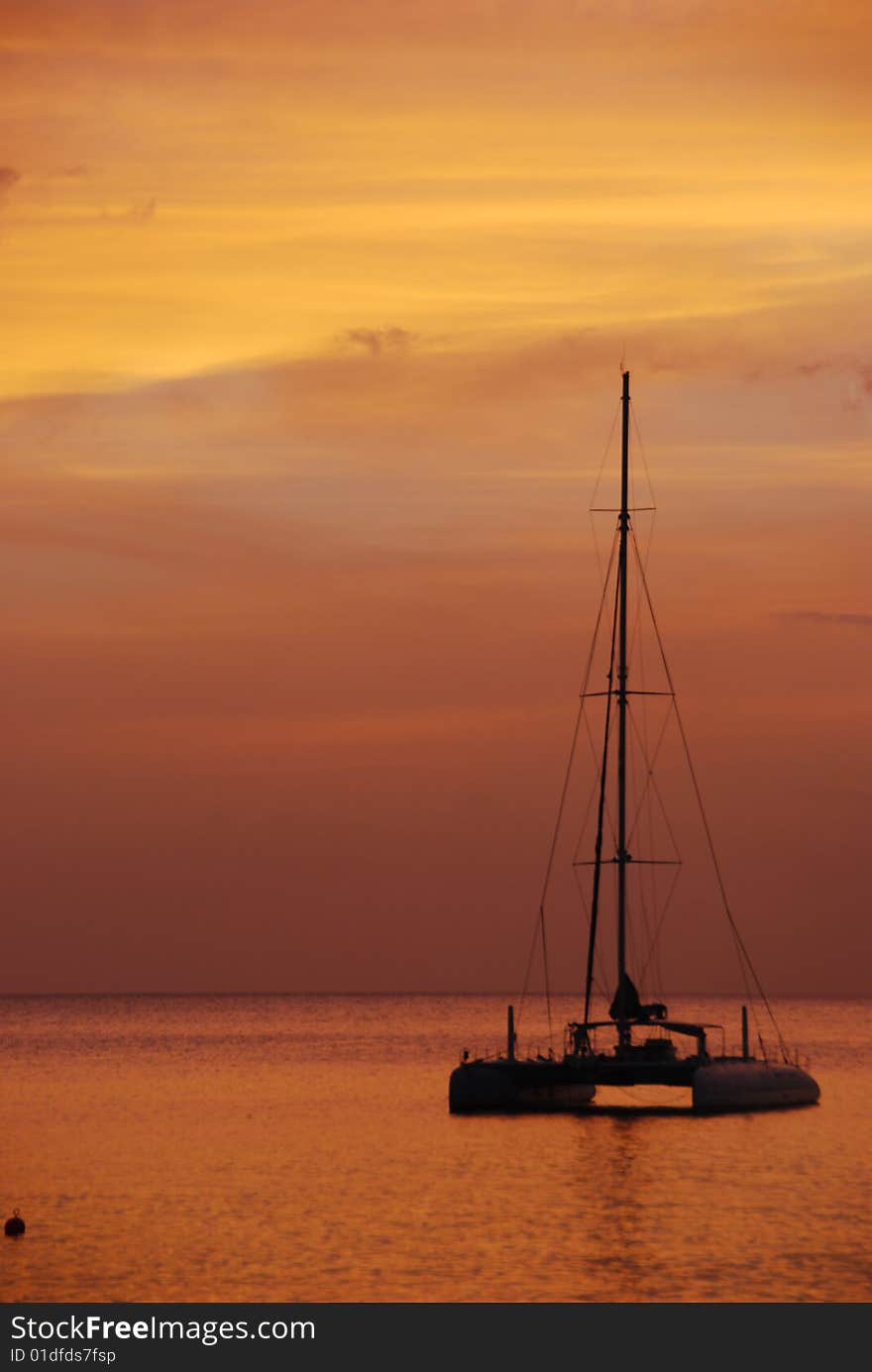 Sunset in the tropics with boat. Sunset in the tropics with boat