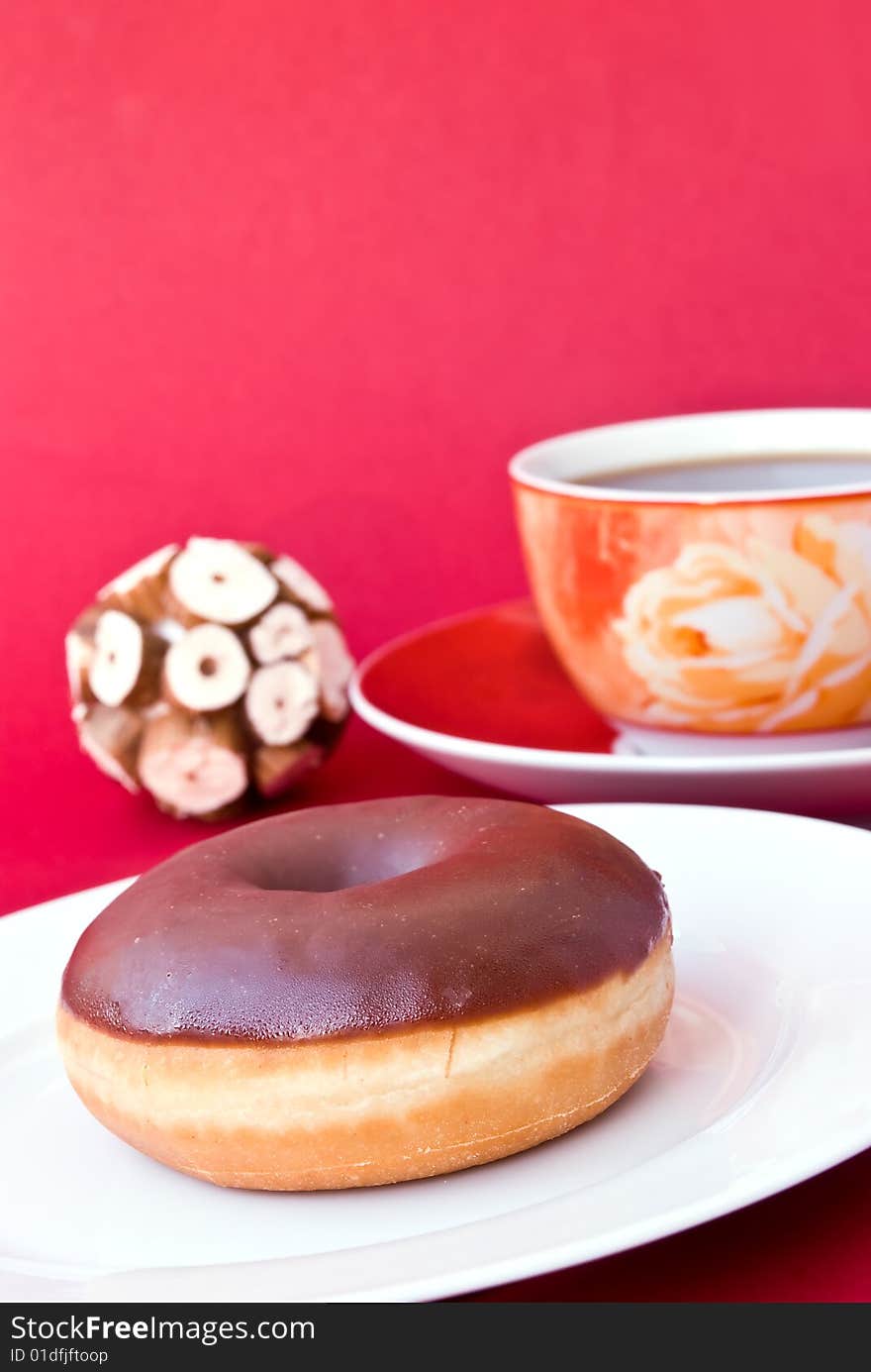 A fresh Coffee with donut