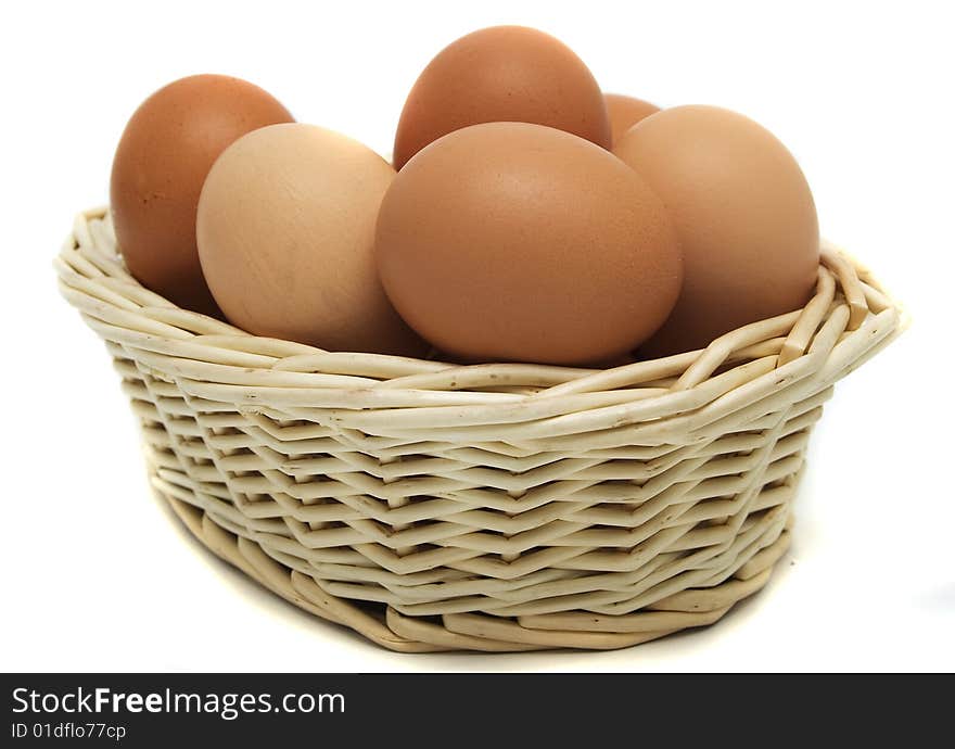 Some red eggs in a basket