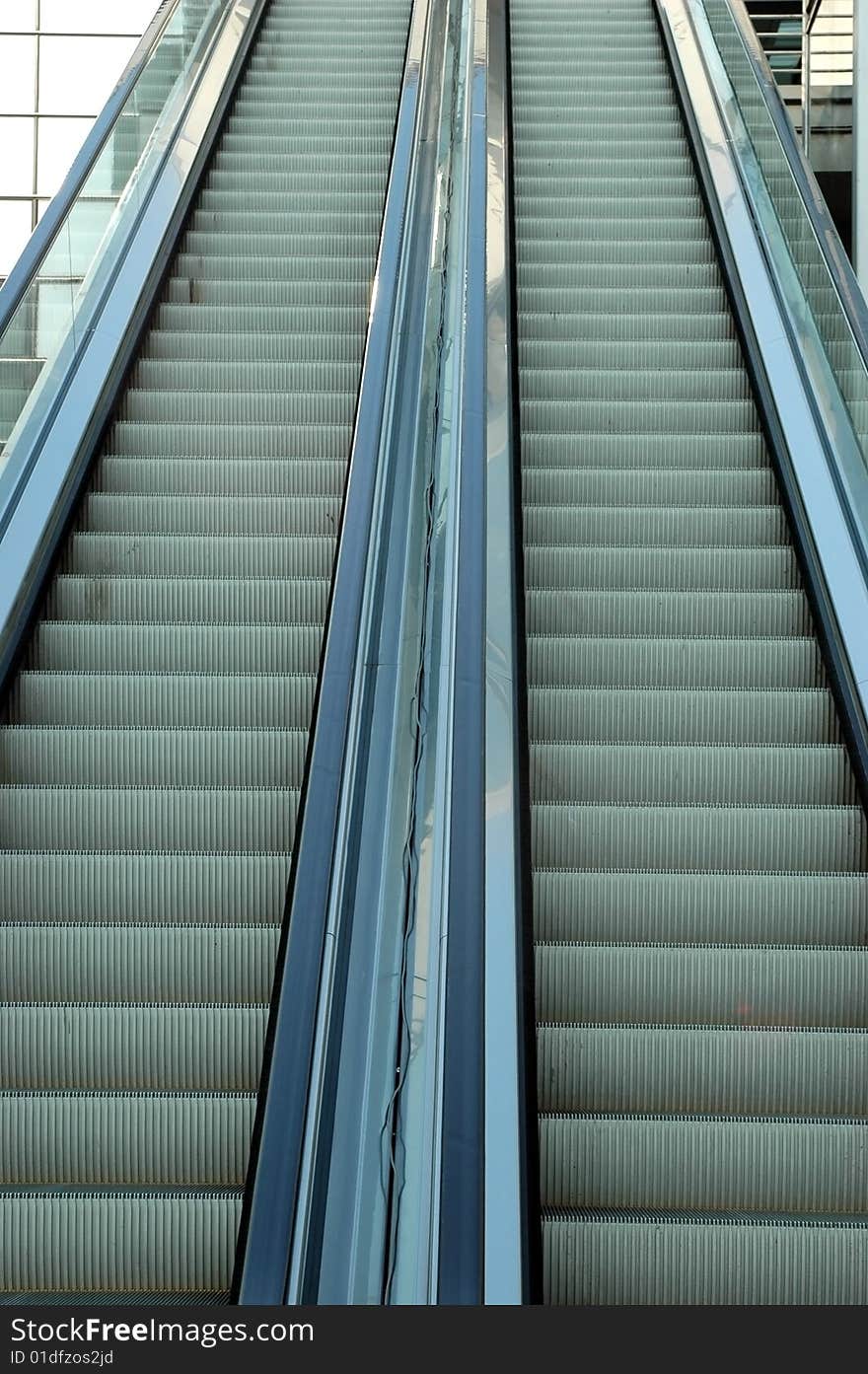 China, Shenzhen city near Exhibition Center area, modern stairlifts going in both directions.