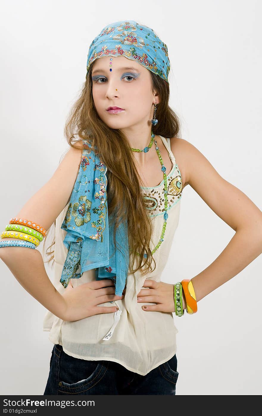 Fashion girl showing jewellery bracelets, scarf and necklace. Fashion girl showing jewellery bracelets, scarf and necklace